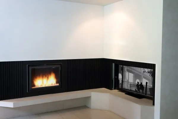 Hoekgashaard in een zwart lamellenmeubel met zitbank, realisatie van ID Interieur